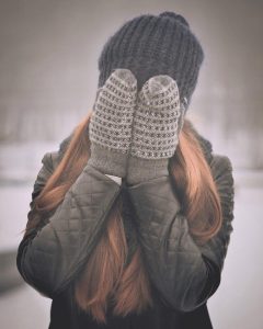 girl hiding her face