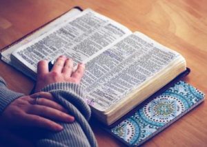 hand on Bible