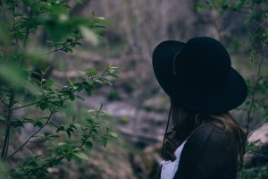 picture of lady with black hat on